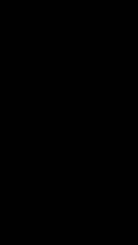 Vertical animated loop of grainy teal night footage: a figure on a swing and a dark alley