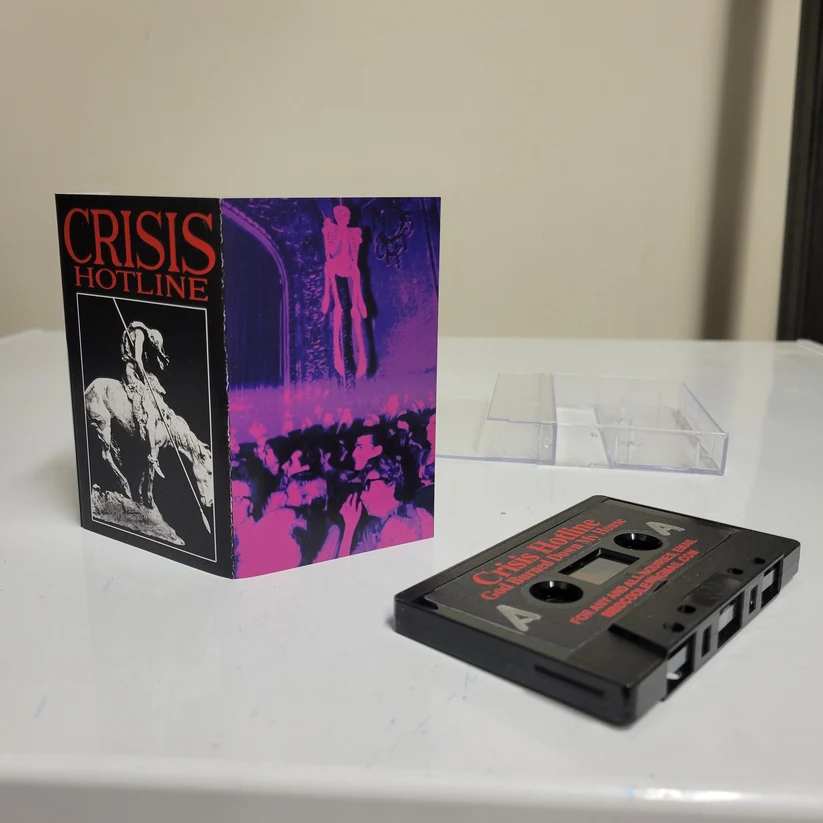 God Burned Down My House cassette by Crisis Hotline with its purple-and-black J-card
